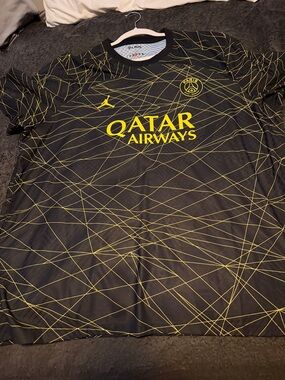 Jordan Men’s Black and Yellow Paris Saint-Germain Graphic Jersey